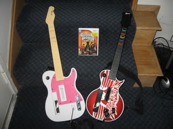 Guitar Hero II, Wii game + 2 Guitars - $40 1