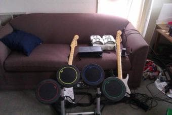 Xbox 360+100 top games+4 controllers+rock band instruments - $350 1