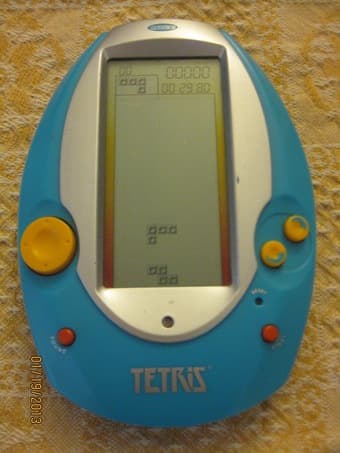 Radica hand held games: Brain Games & Big Screen Tetris 2