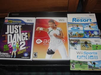 Nintendo Wii Black Sports Resort Bundle with two additional games, $99 2