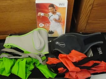 Nintendo Wii Black Sports Resort Bundle with two additional games, $99 3