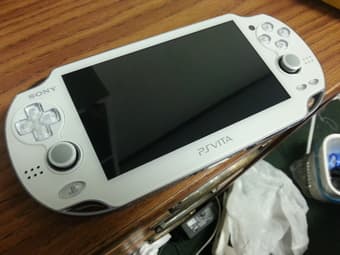 white ps vita forsale with 8gb memory card 1