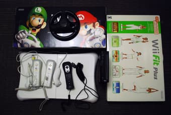 Wii + Wii Fit plus + three controllers + mario kart + extra!! 1
