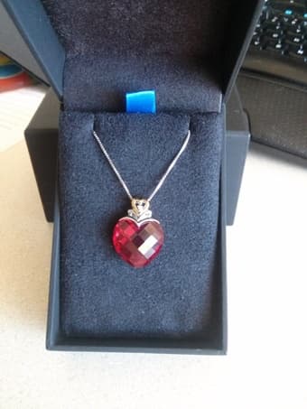 Silver, gold and ruby pendant $50 1