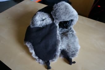 Trapper hats and Boston Red Sox cap 1