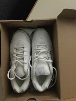 Selling new white wilson women's tennis shoes in size 6.5M for $30 1