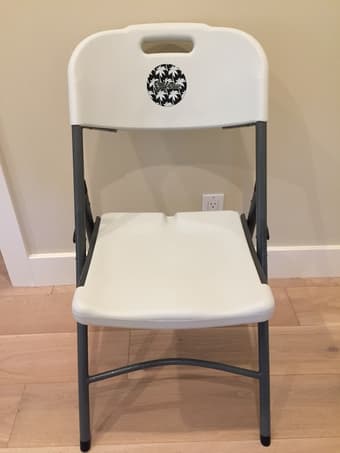 Laundry hamper, headphone stand, travel books, folding chair 2