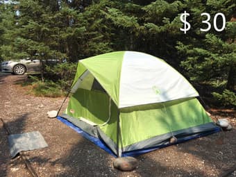 Camping stuff: coleman 4-person tent and teton sleeping bag 1