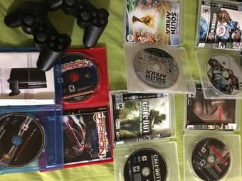 PS3 with 6 CDs and WII complete set for two players 1