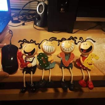 dorable\seated\ceramic dolls 3