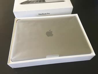 MacBook Pro 13 inch - in excellent condition, like new, still in origi 2