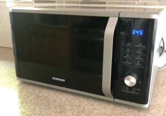 Samsung  Countertop Microwave (1.1 cu. ft. - 1,000 Watts) 1