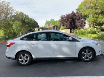 2013 Silver Ford Focus Sedan, clean title – 88318 miles - $5,600 2