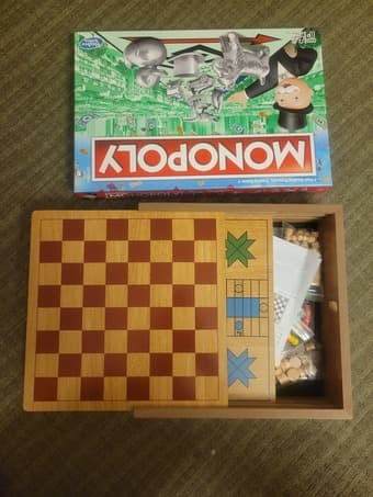 New unopened board Games (7 in 1 chess++ & Monopoly) 1