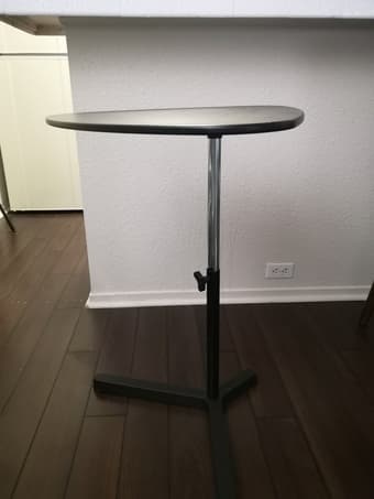 small adjustable height single stand table 1