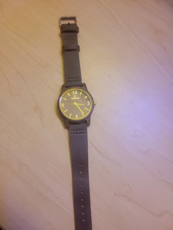 Brown watch with wooden frame 1