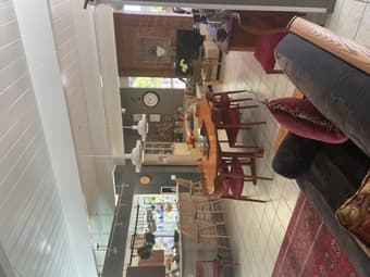 Furn main room w/priv bath and view of pool in modern house 1