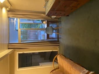 Furn main room w/priv bath and view of pool in modern house 4