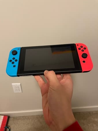 Like-new Nintendo Switch (less than 2 months old) 1