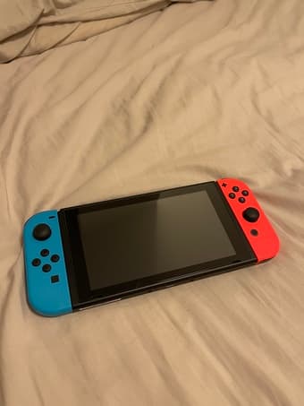 Like-new Nintendo Switch (less than 2 months old) 2