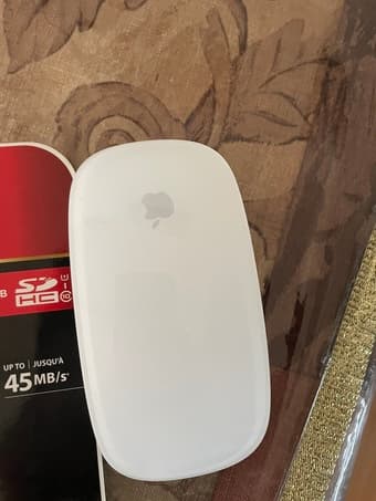 Apple magic mouse, Ti 83 calculator, Memory card 1