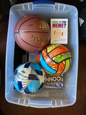 Bin of Assorted Balls and Board Games 1