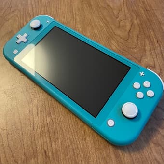 Nintendo Switch Lite— barely used! 1