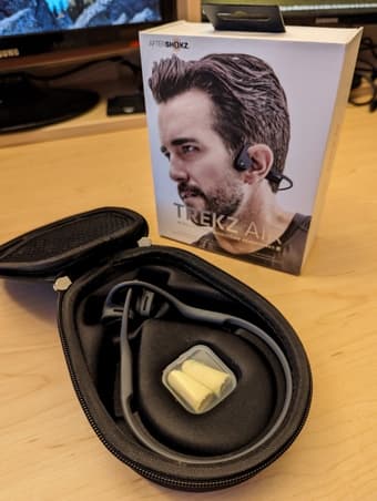 Lenovo tablet, Trekz Air open-ear headphones, Amazon echo 1