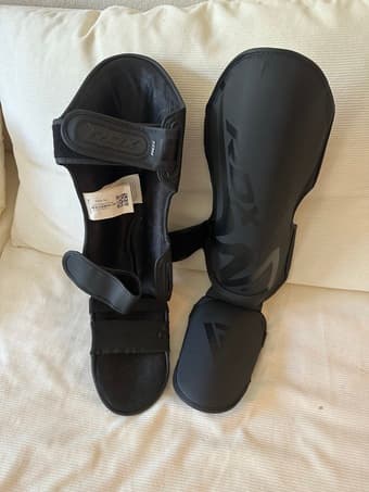 Muay thai shin guards and combat head gear 1