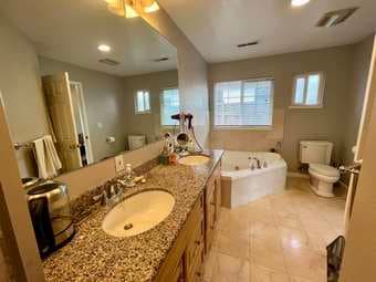 Cozy master bedroom in a furnished 5BR/3.5BA just off of Oregon and Al 1