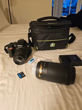 Nikon D3500 DSLR w/ 55 mm lens, bag, memory card 1
