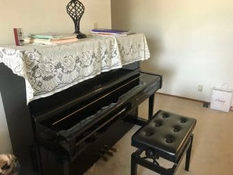 Yamaha Piano and 3 Bikes 1