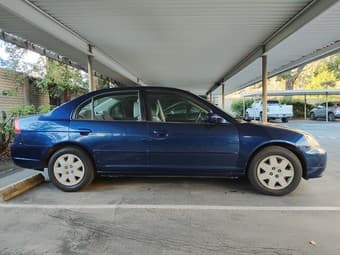 2002 Blue Honda Civic EX 1.7L FWD - $4,950 ($4,500 for students) 2
