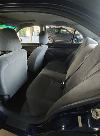 2002 Blue Honda Civic EX 1.7L FWD - $4,950 ($4,500 for students) 4