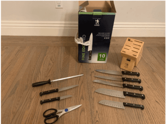 Lightly Used Knife block set + 3 extra knives + knife sharpener 1