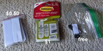 Wall hanging things: velcro command strips, adhesive pads, nails+pads 1