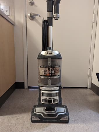 Desk, microwave, vacuum cleaner, chair, iron, various household items 2