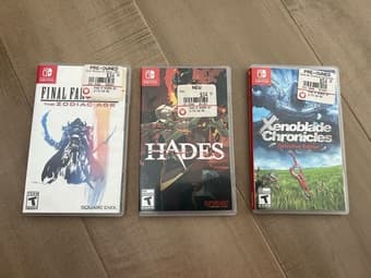 Gently Used Nintendo Switch Lite with Three Games 2