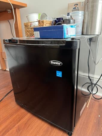 Black Danby mini fridge 1