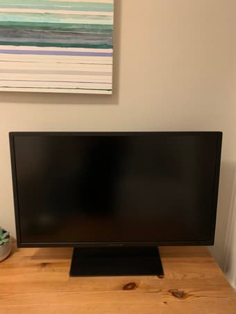 For sale: 32” monitor, Giant bike, and air mattress. 1