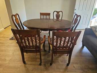 Dining table with 6 chairs and baby crib with mattress 1