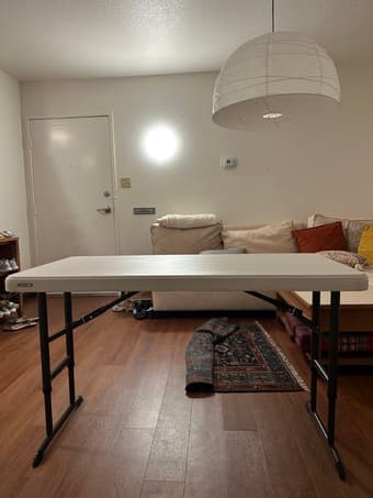 48" x 24" Table, adjustable height, like new (very good condition) 2