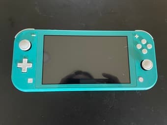 For sale: Teal nintendo switch lite and carrying case 1