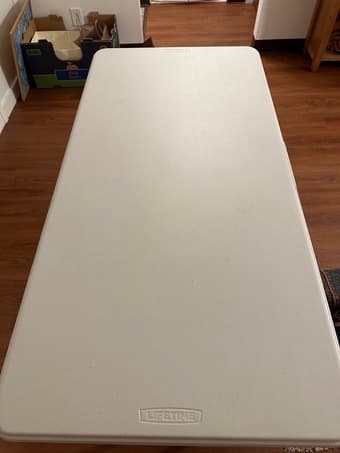 48" x 24" Table, adjustable height, like new (very good condition) 3