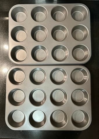 Standard muffin tins x 3 and Wilton cake pans x 2 - like new! 1