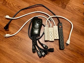 Power strips x 4 & surge protector + power cord x 1 1