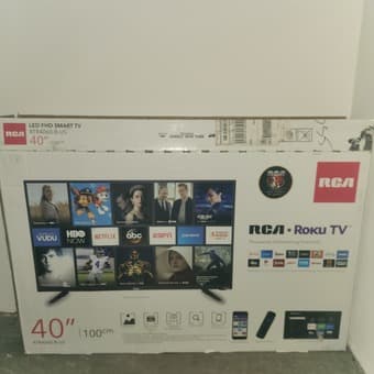 Smart TV with TV stander and Freezer 1