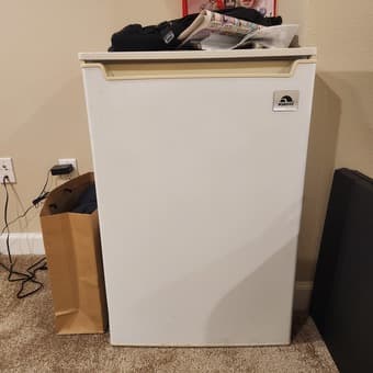 Smart TV with TV stander and Freezer 4