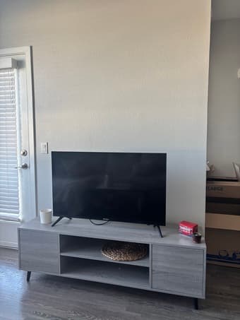 Price reduced in half TV and TV stand together 1