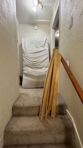 Free twin sized bed frame and mattress with mattress pad. 2